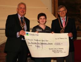 Downs Syndrome North East receives £2515 from the Rotary Club of Durham's Swimathon 2012